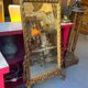 Antique mirror above a chest of drawers or between two windows, carved wood, 18th century