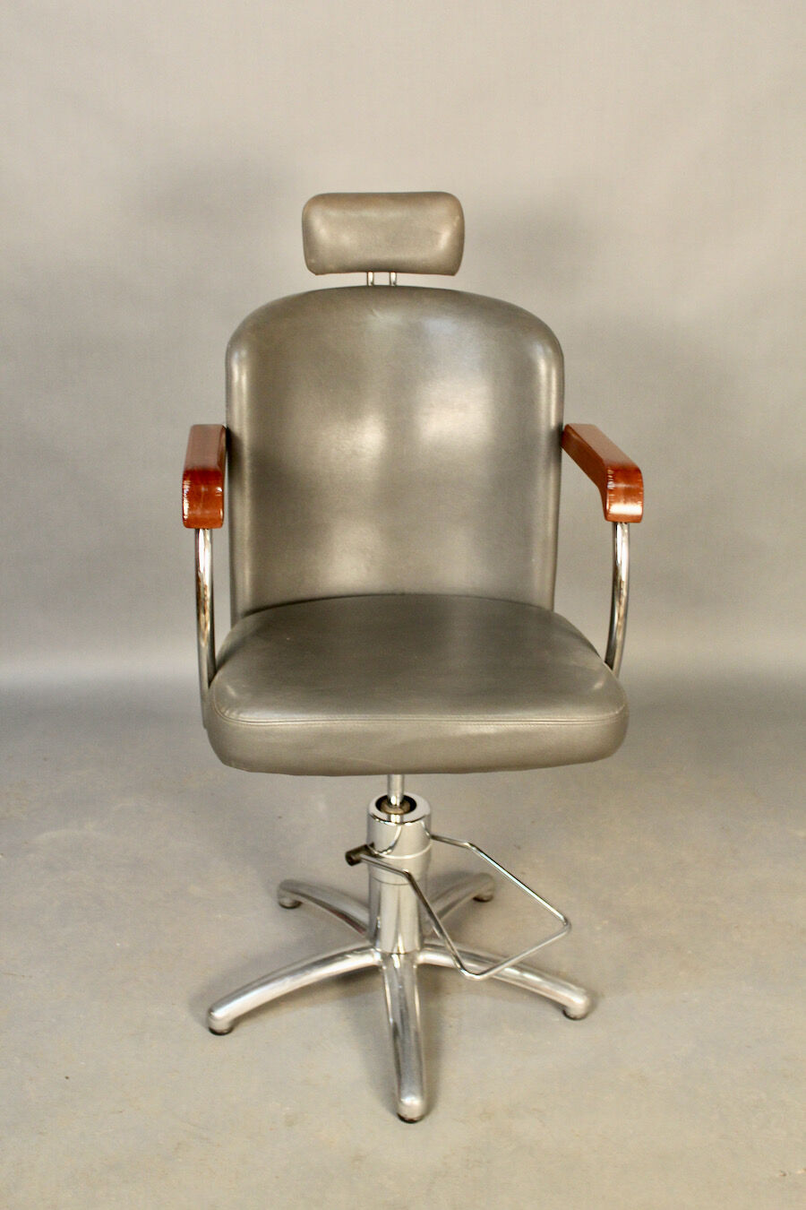 Spotlight hairdresser and her vintage barber chair