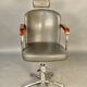 Spotlight hairdresser and her vintage barber chair