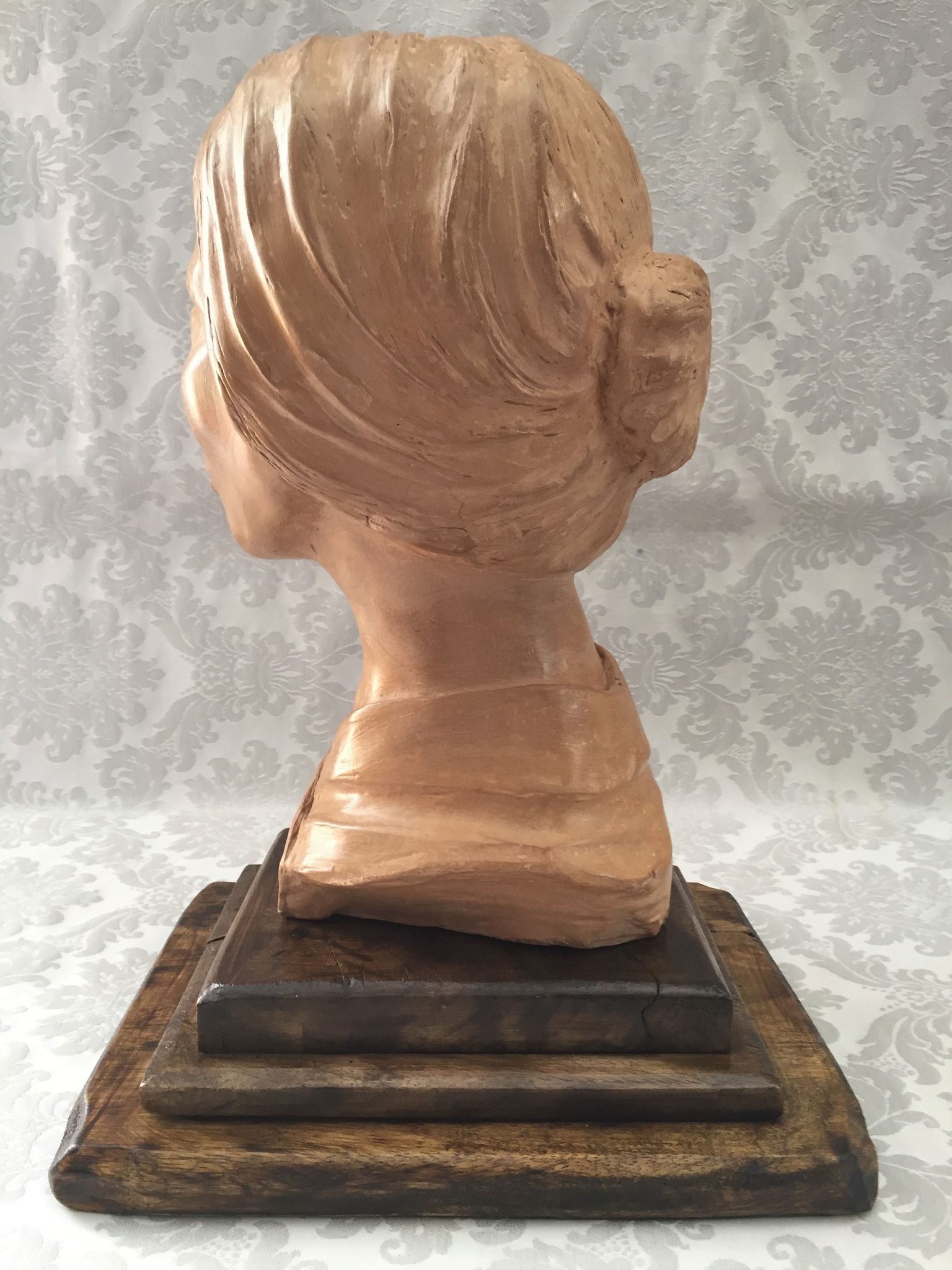 Bust in raw earth of atelier bust face of woman signed j.c.g.