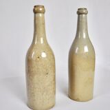 Wine bottles in varnished earth