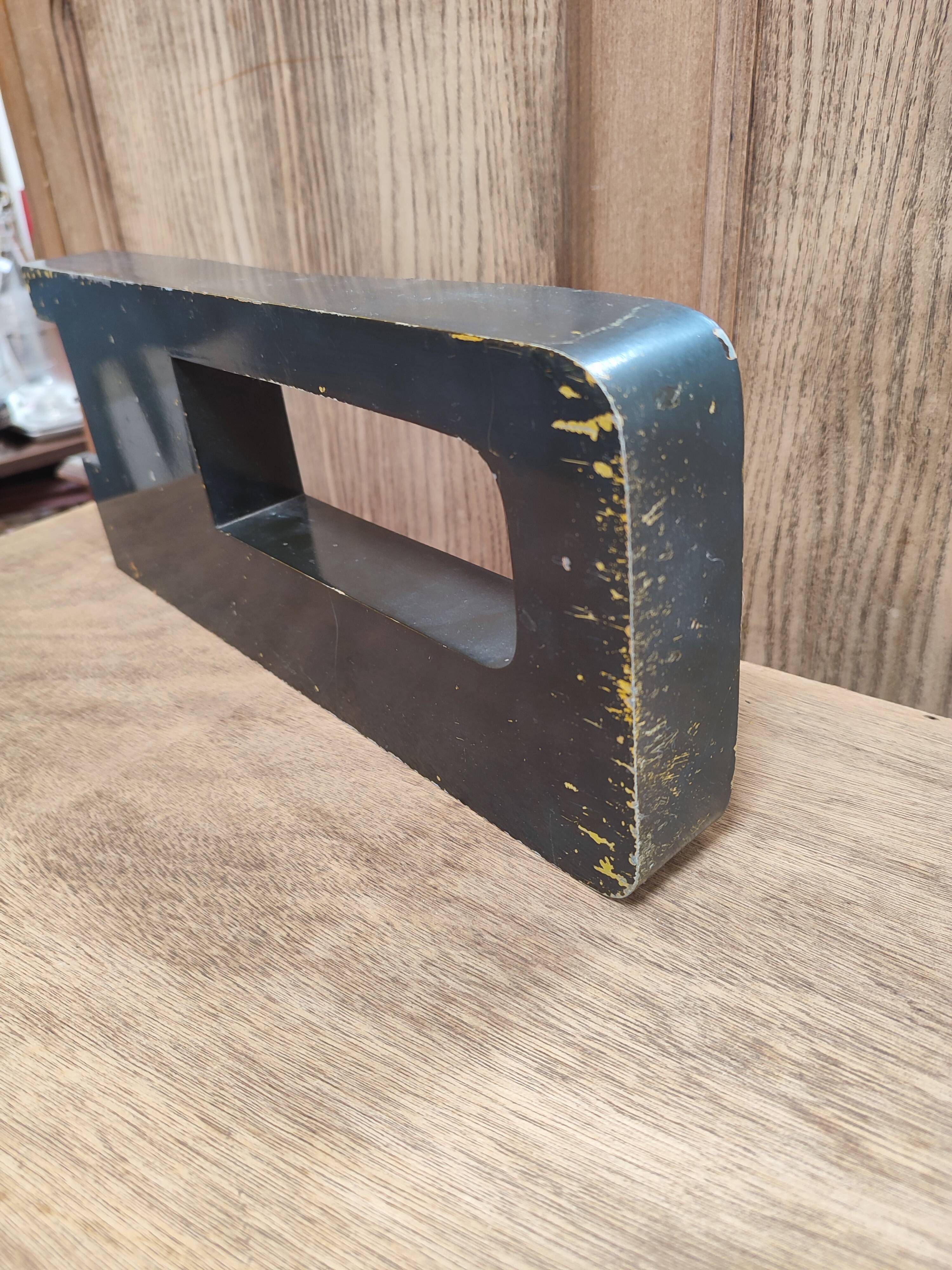 Vintage sign letter D