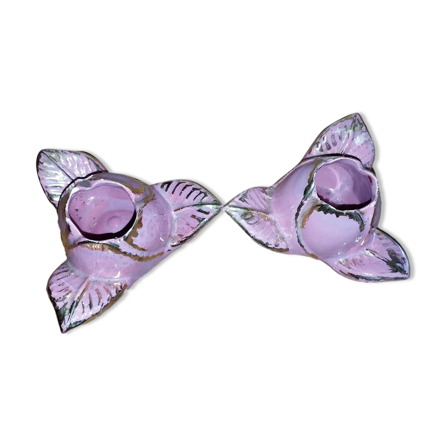 A pair of pink earthenware candlesticks (1940s–50s)