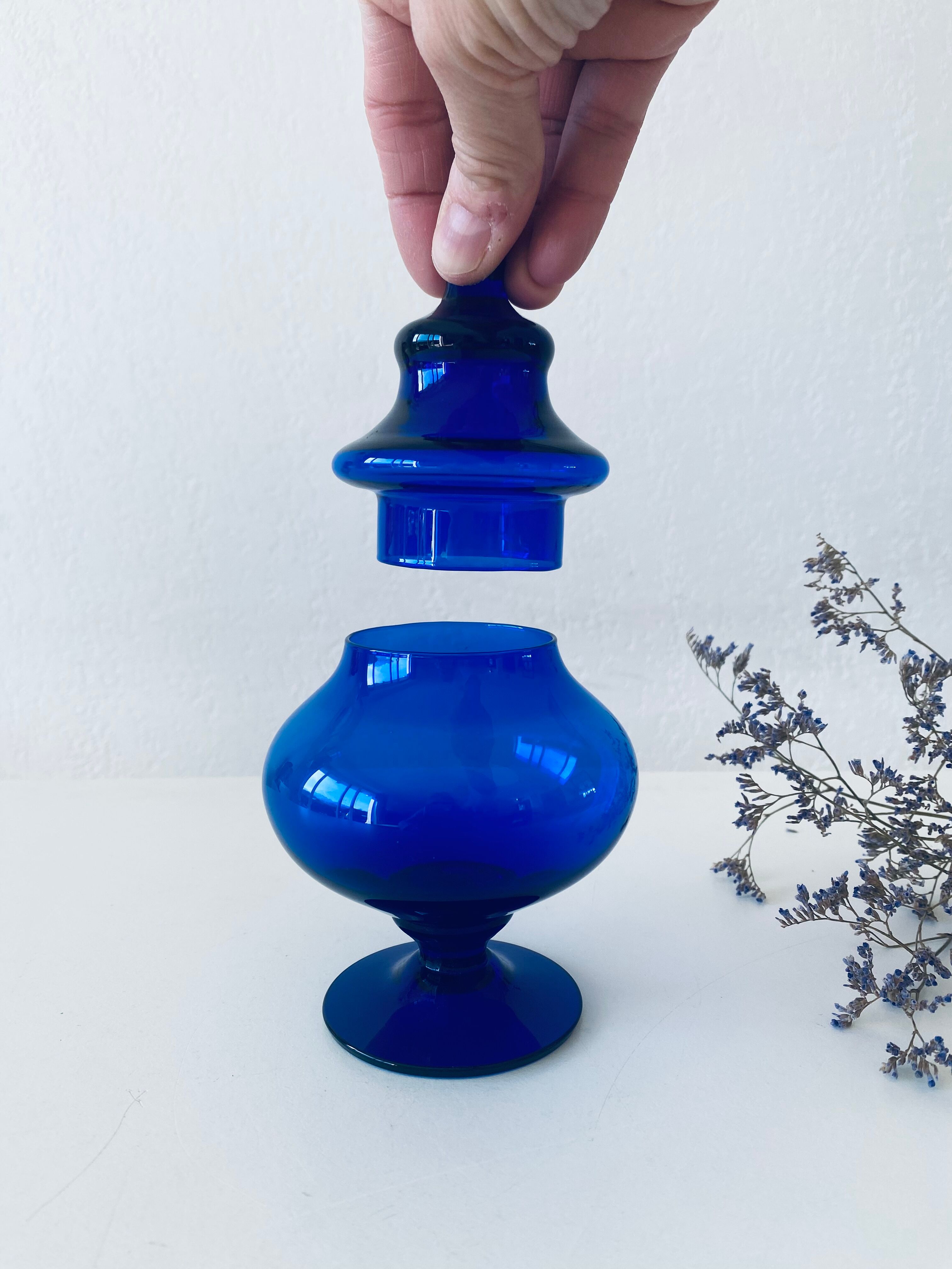 Blue glass apothecary shaped bottle