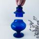 Blue glass apothecary shaped bottle