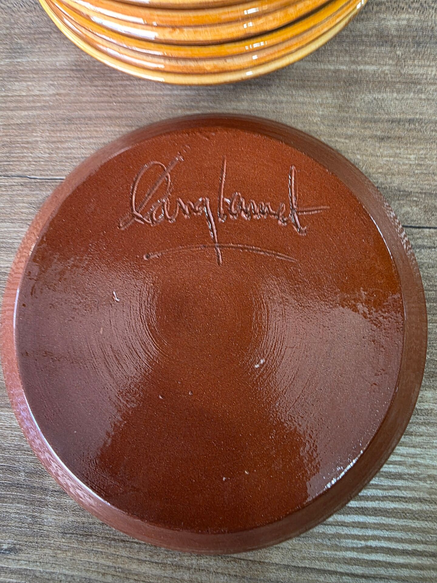 8 vintage dessert plates with a signed decoration.
