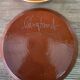 8 vintage dessert plates with a signed decoration.