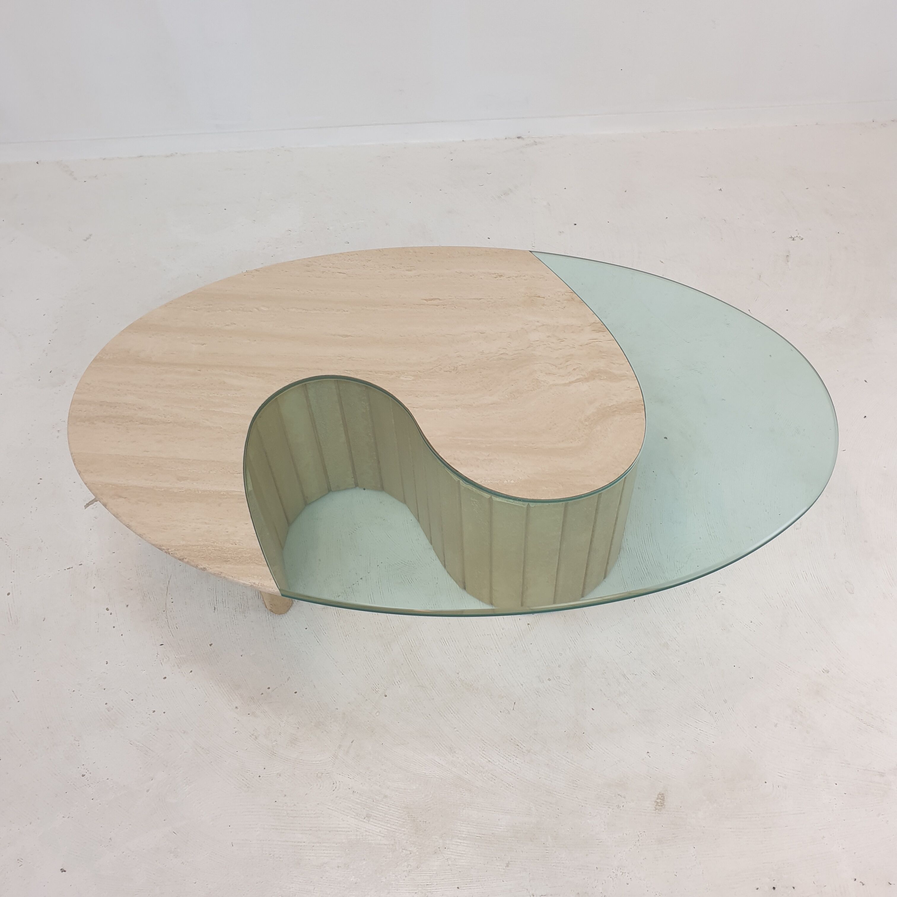 Italian travertine and glass coffee table, 1980's