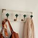 Wall-mounted coat rack in bleached wood and emerald green ceramic hooks –