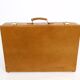 Ensemble de trois valises en cuir vintage