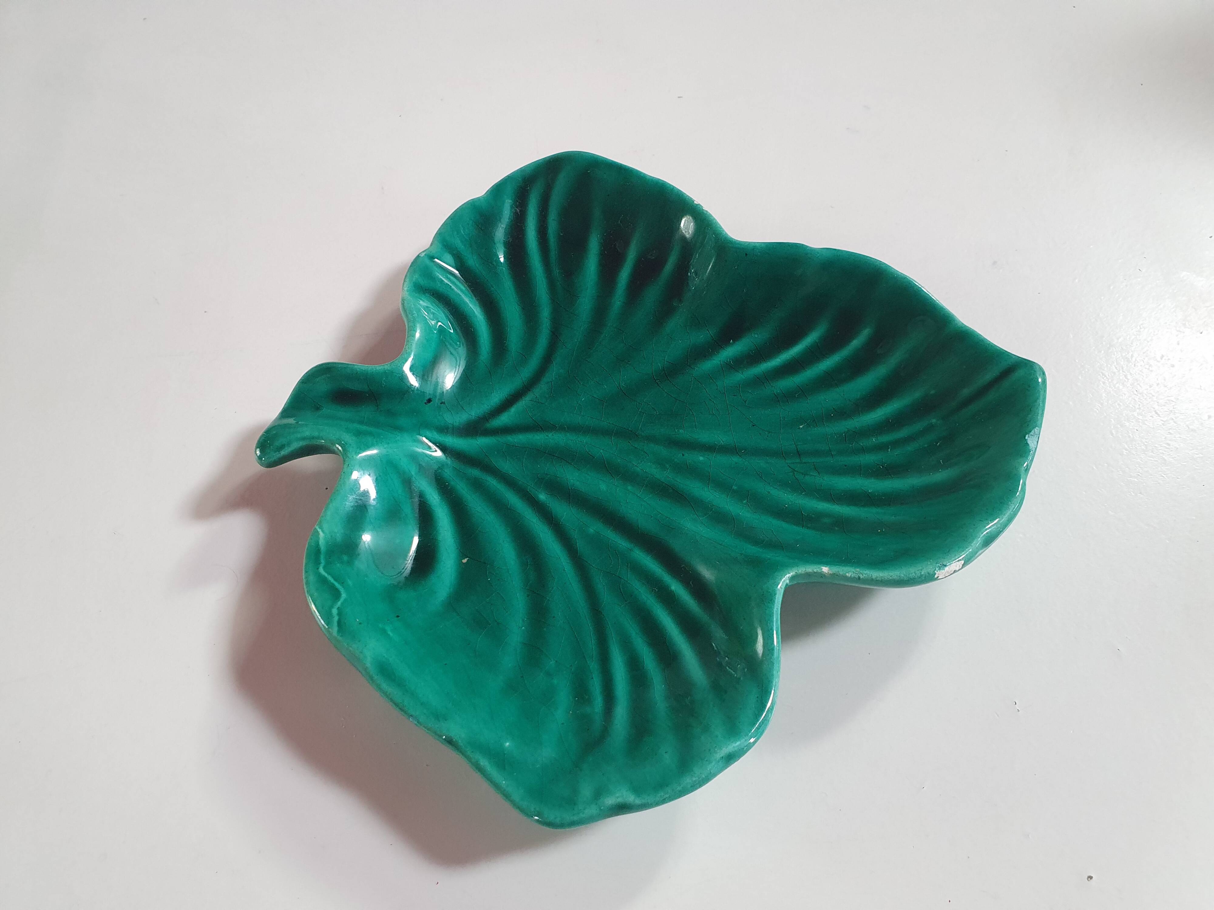 empty pocket cup leaf shape green ceramic slip, some chips on one edge