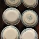 6 mismatched flat plates Terre de fer bleu Alésia Marcel Longchamp