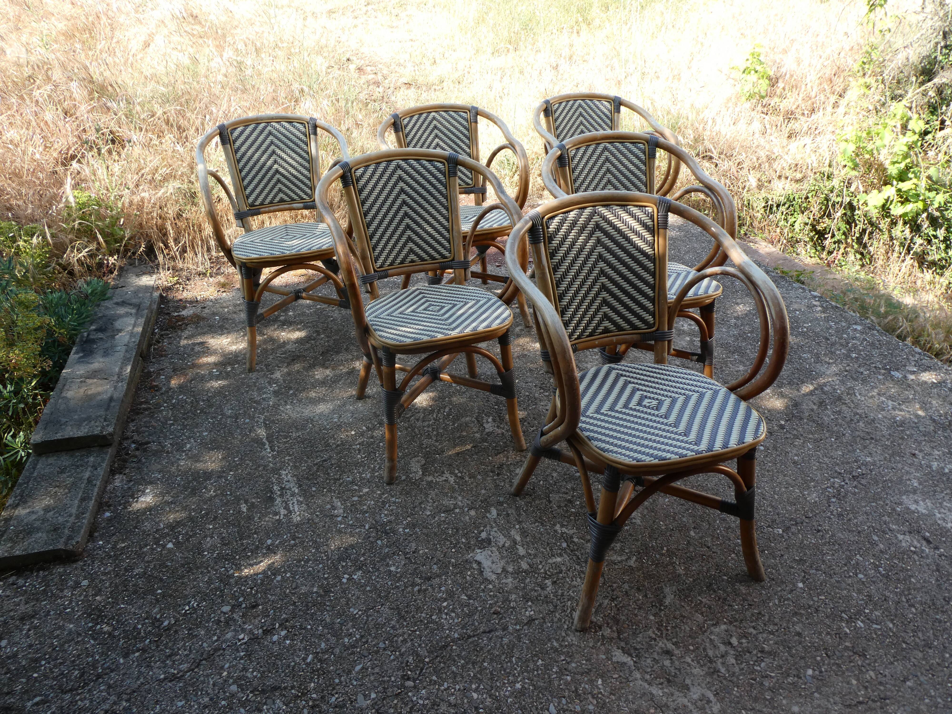 Ensemble de 6 fauteuils bistrot de terrasse en rotin type "parisienne".
