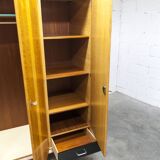 French wardrobe with tapered legs, 3 doors, 1 mirror (27*130), and 1 drawer.