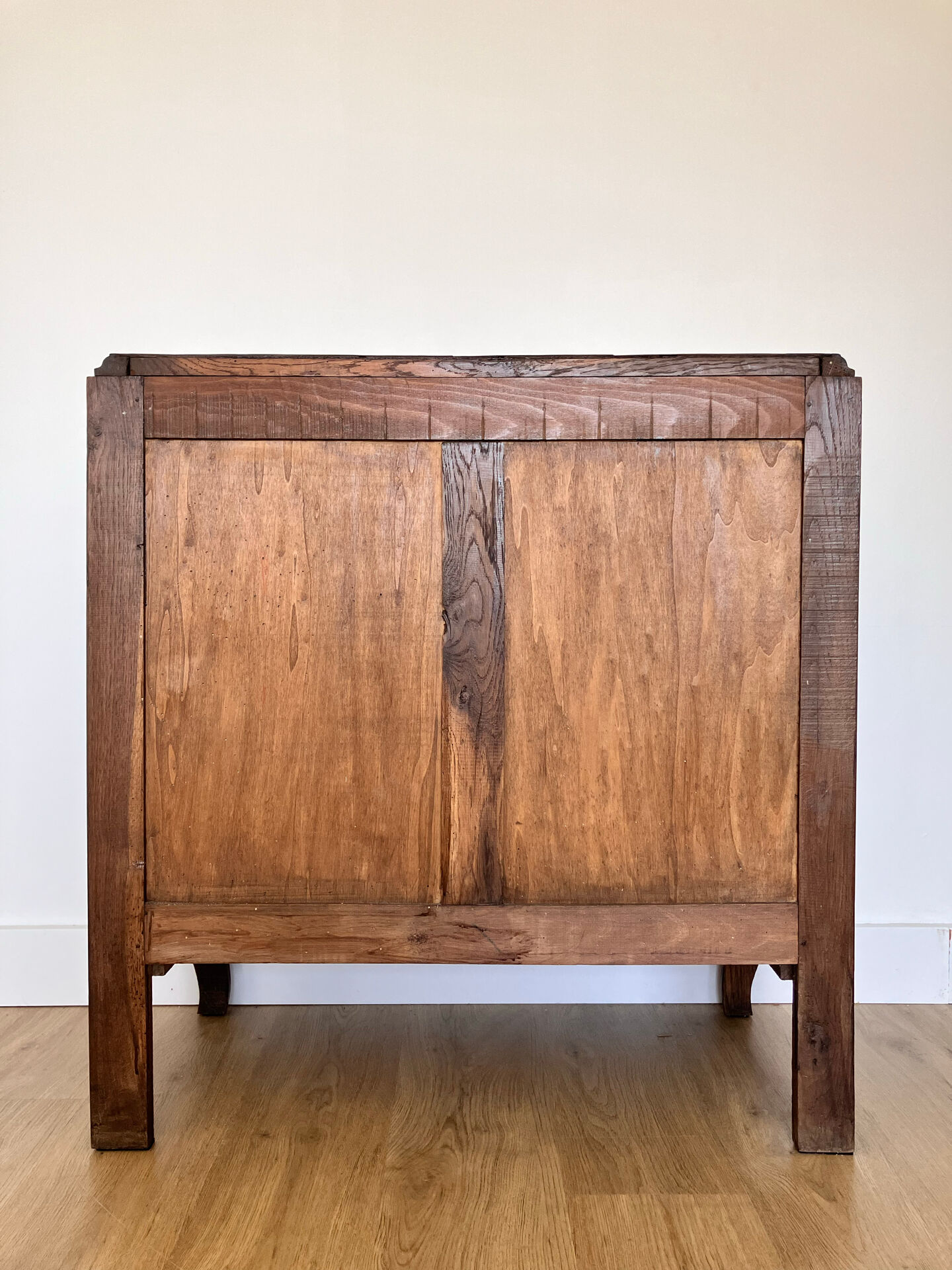 Antique commode with carved relief