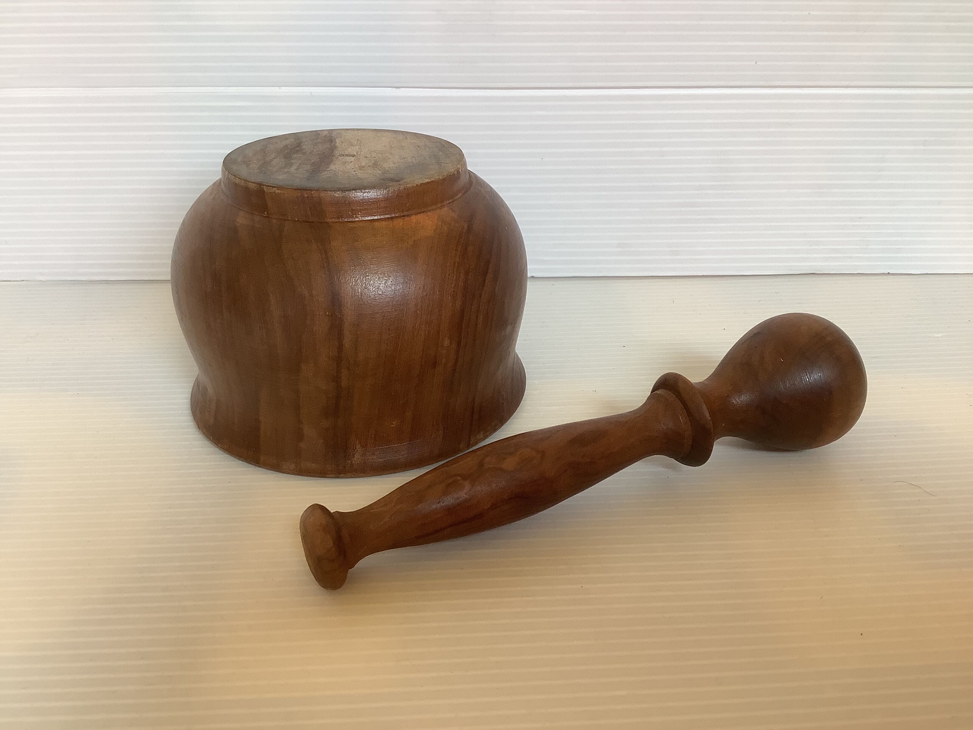 Mortar and wooden pestle