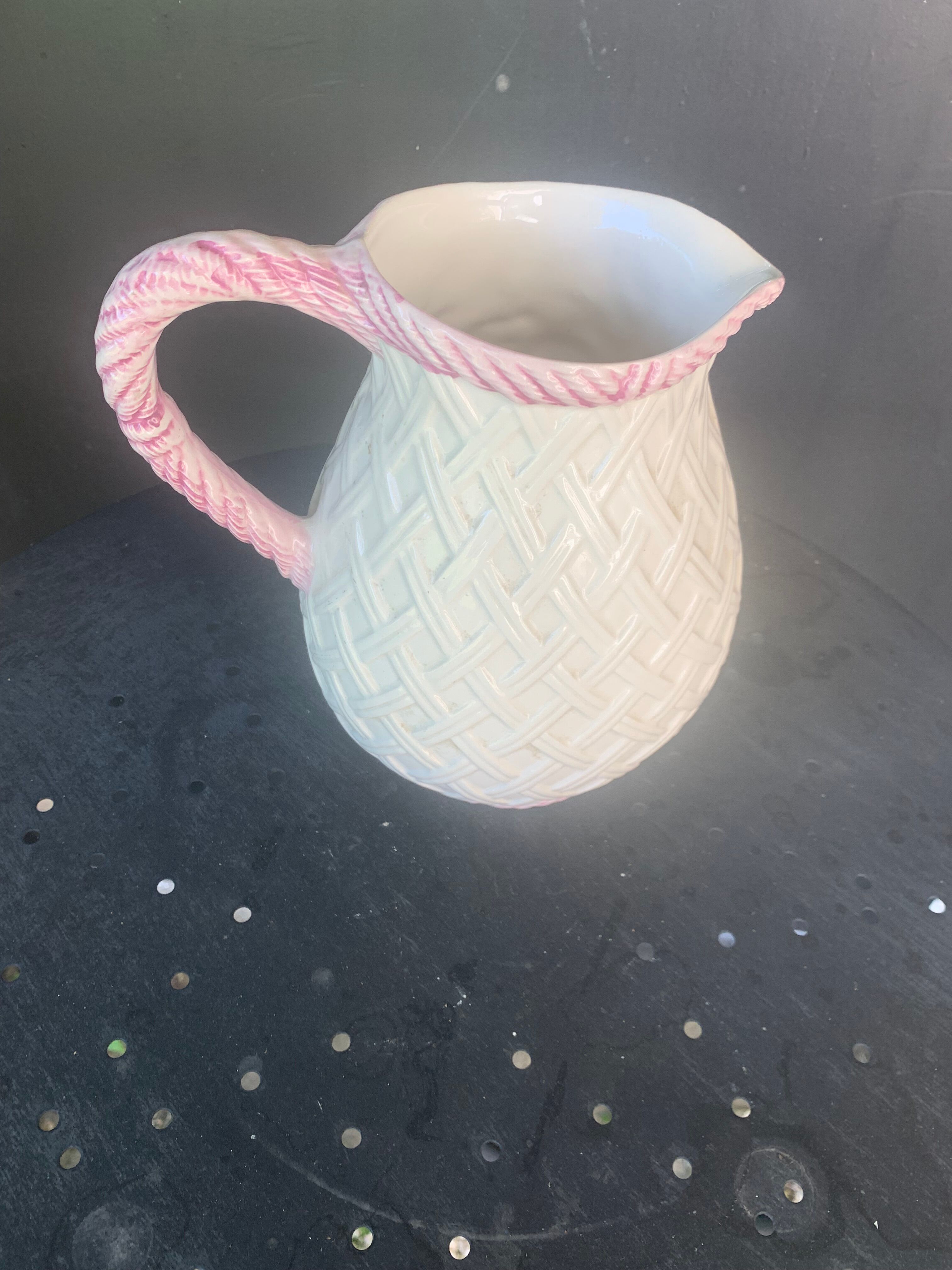 Glazed ceramic slip jug with vintage basket and fruit motif