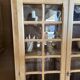 Small raw wood display cabinet