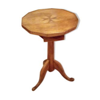 Solid walnut pedestal table with a marquetry Maltese cross on the top
