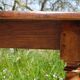 Antique walnut console table with honey spoon legs.
