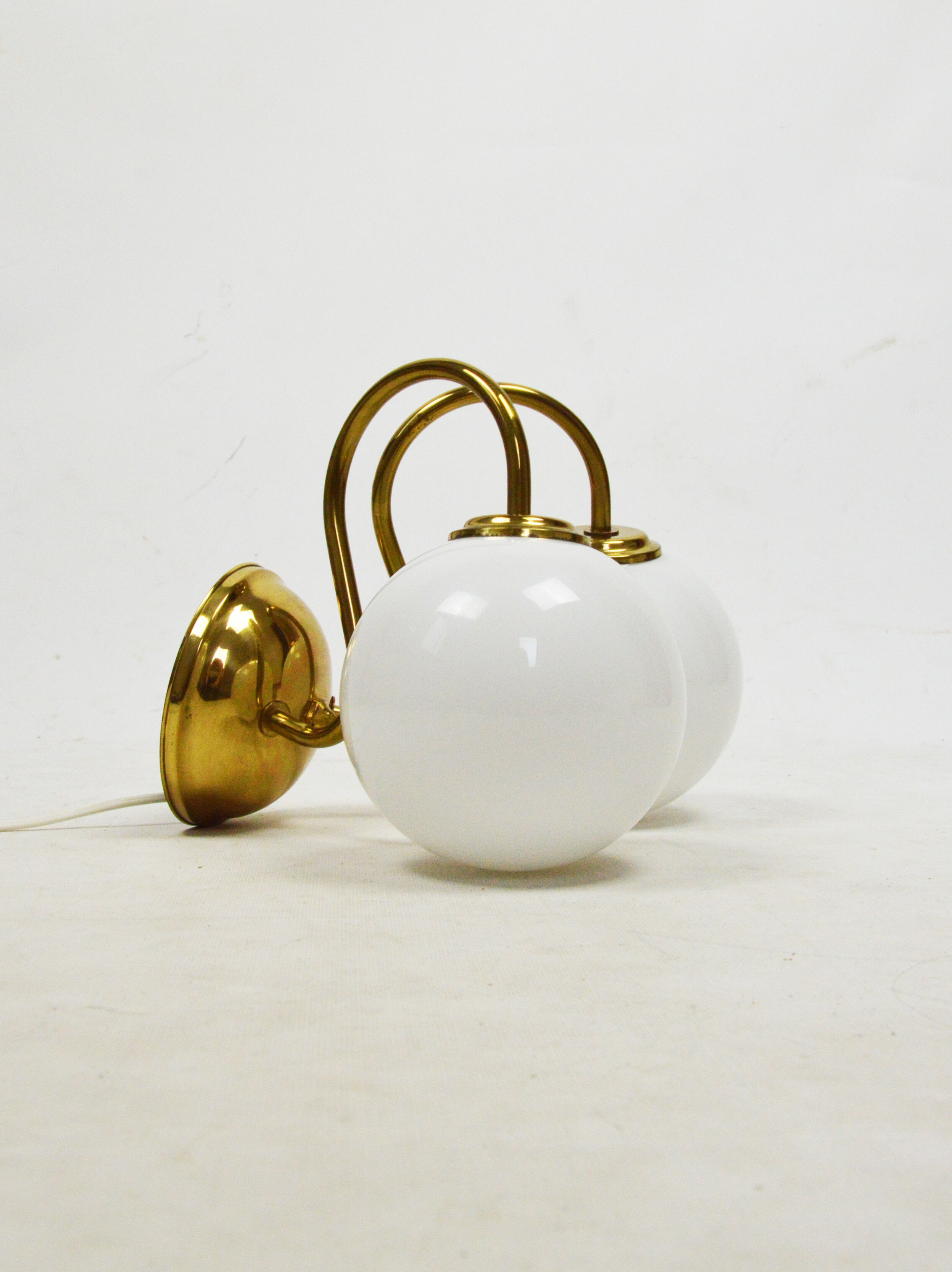 A pair of wall lamps, Poland, 1980s