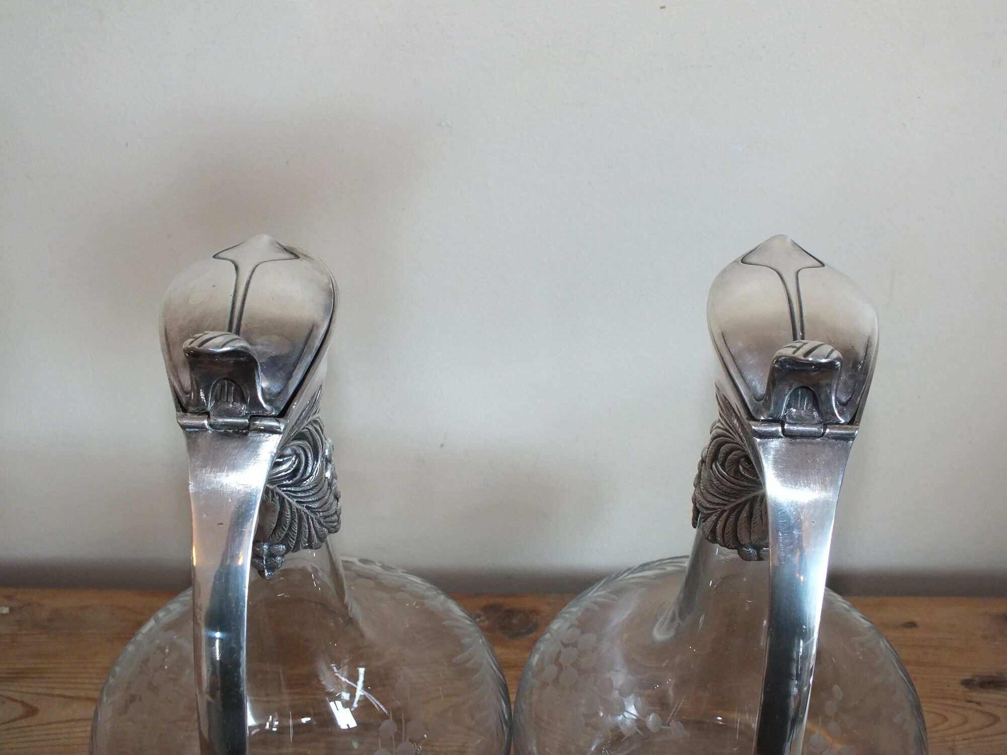 Pair of Gallia ewers in crystal and silver metal