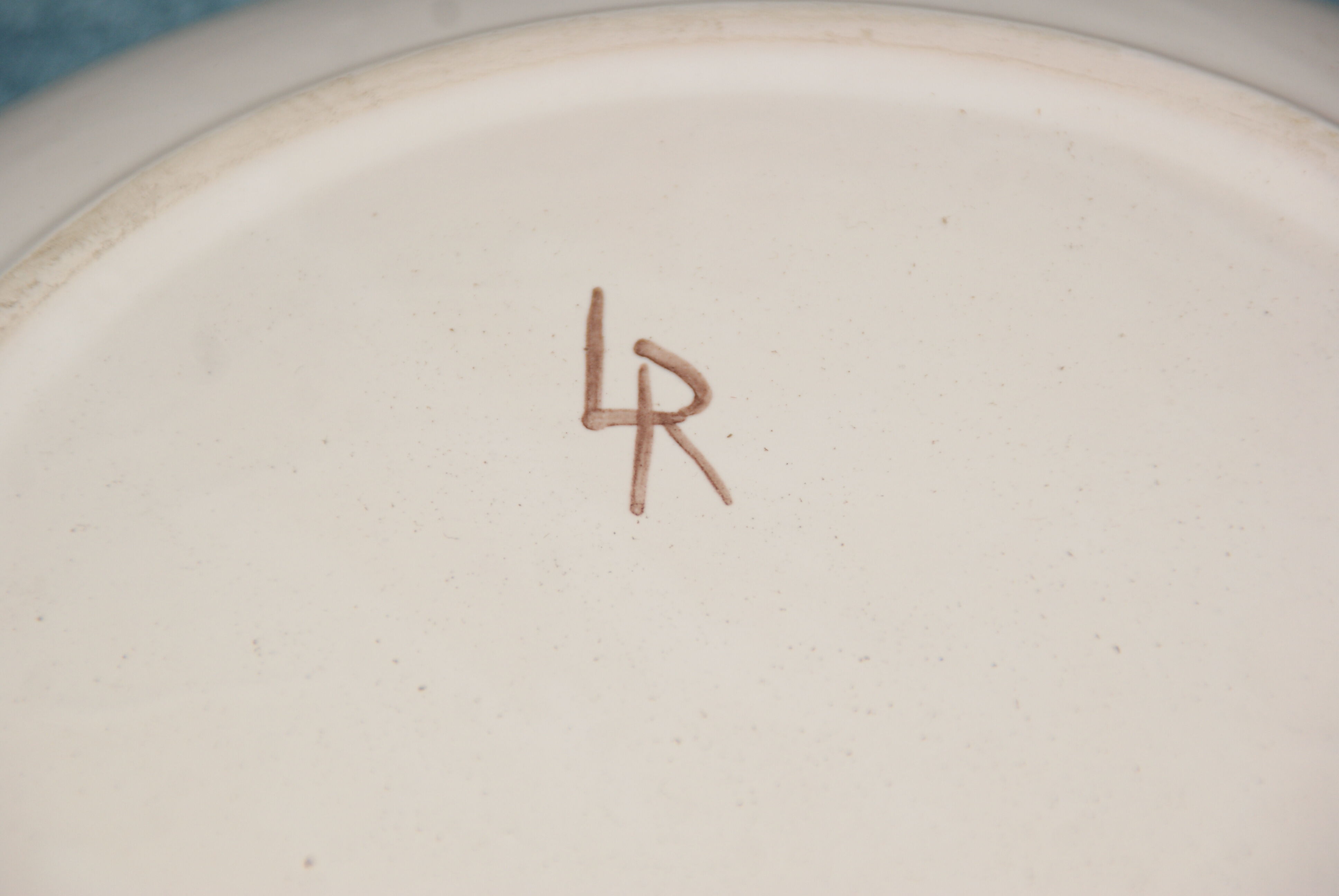 Large dish with rooster decoration, signed