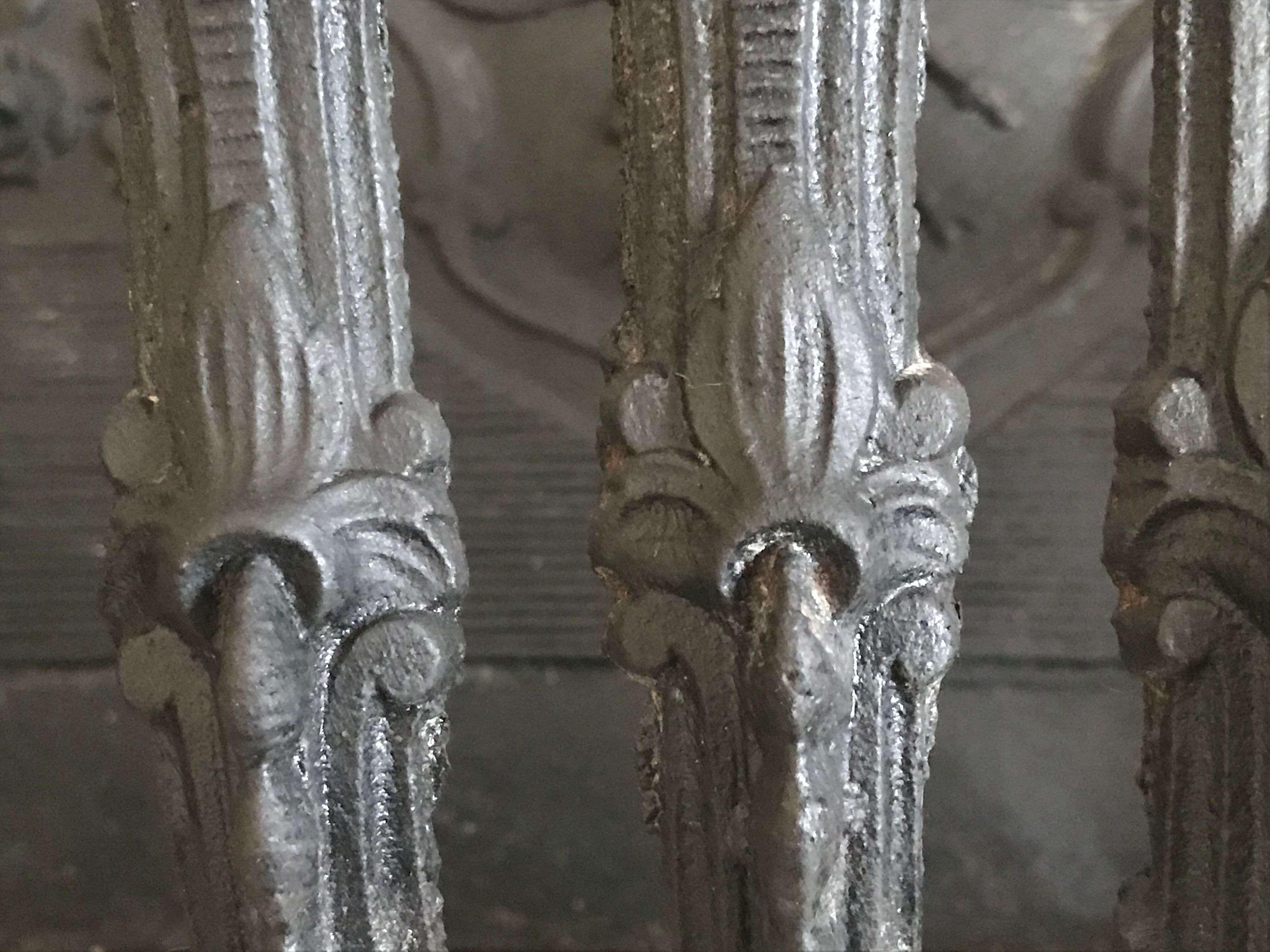 Cast iron fireplace cradle log holder