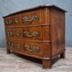 Curved commode from the Louis XIV period in marquetry - adorned with gilded bronze fittings.