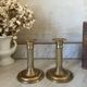 Pair of fluted column candlesticks in brass