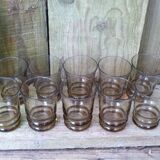Set of 10 brown glasses and a carafe made in Belgium