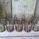 Set of 10 brown glasses and a carafe made in Belgium