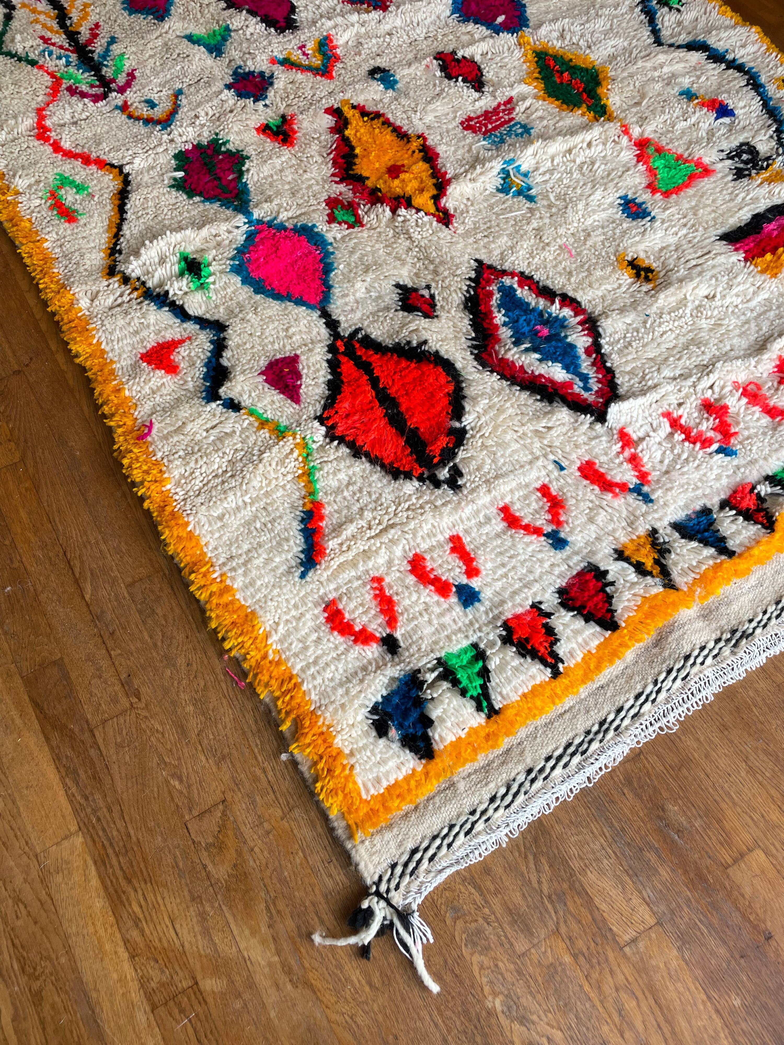 Berber carpet azimuth colored white with multicolored and fluorescent patterns