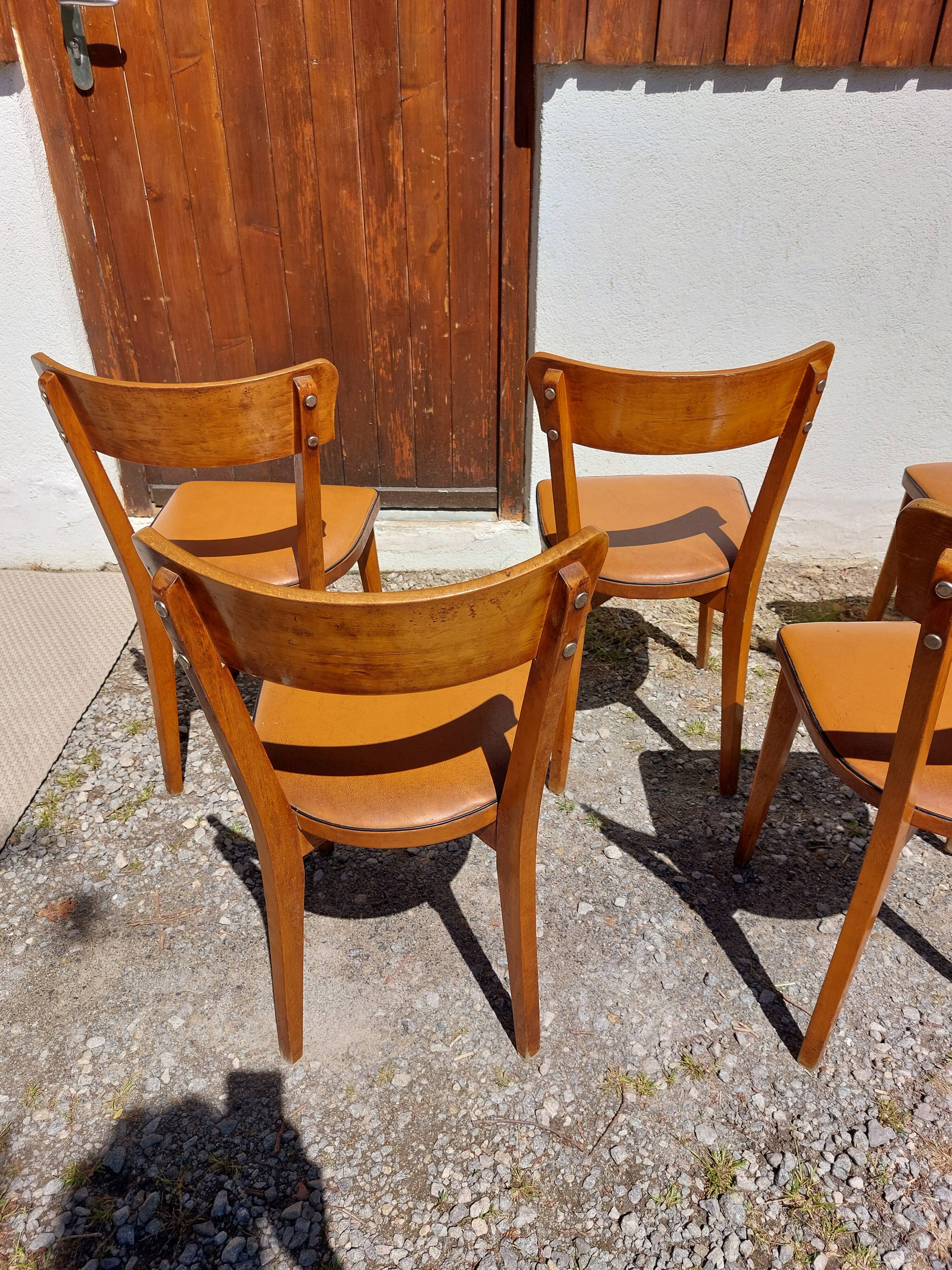 6 vintage 1960s wooden bistro chairs with camel faux leather.