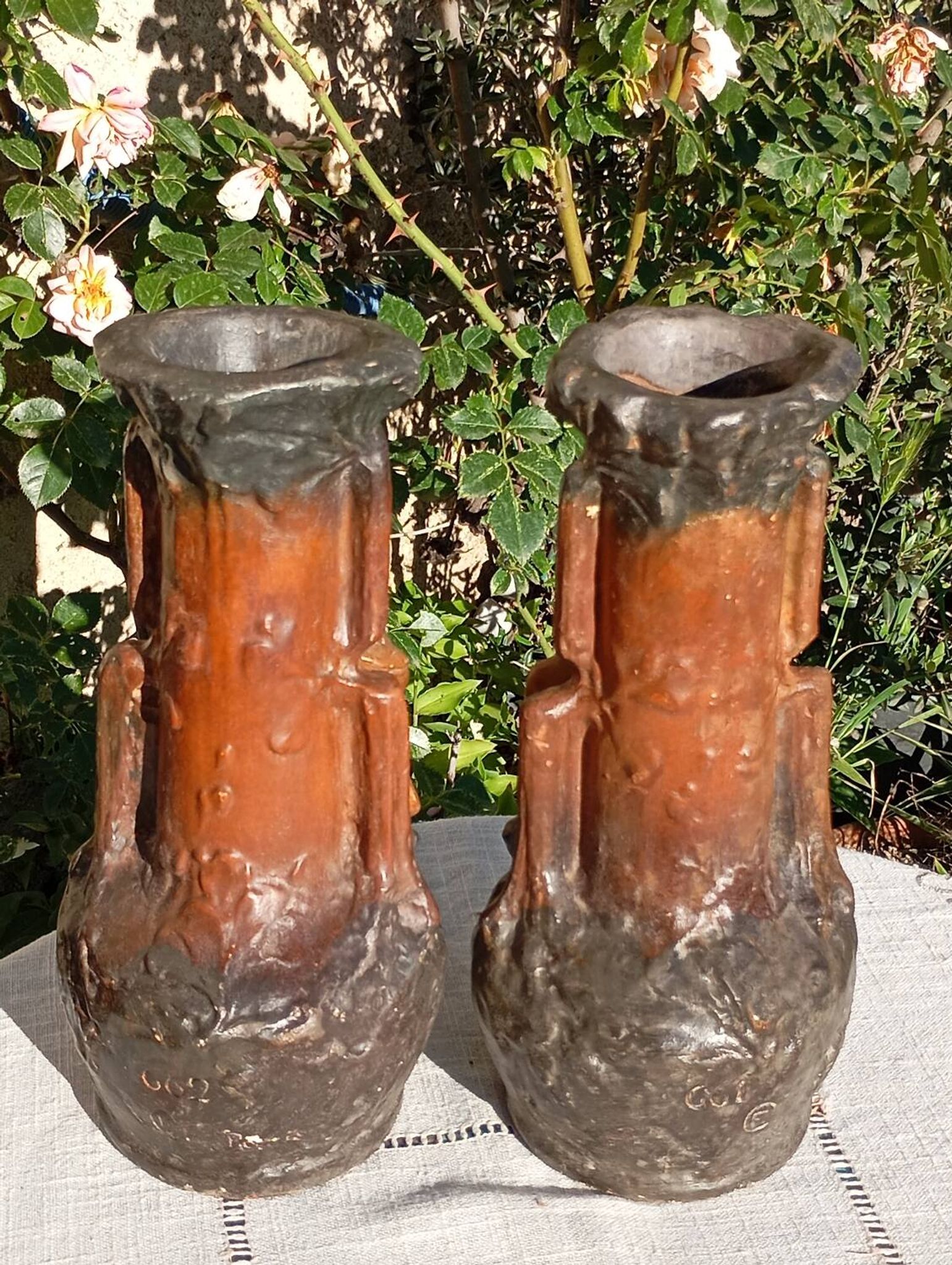 Pair of plaster vases Longchamp Barbotine vases 1900 signed, 28.5 cm high