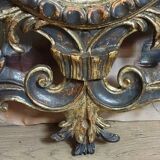 Antique Louis XV style mirror, richly carved with scrollwork, shells, and foliage.