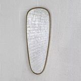 Golden rearview mirror and free form from the 1950s