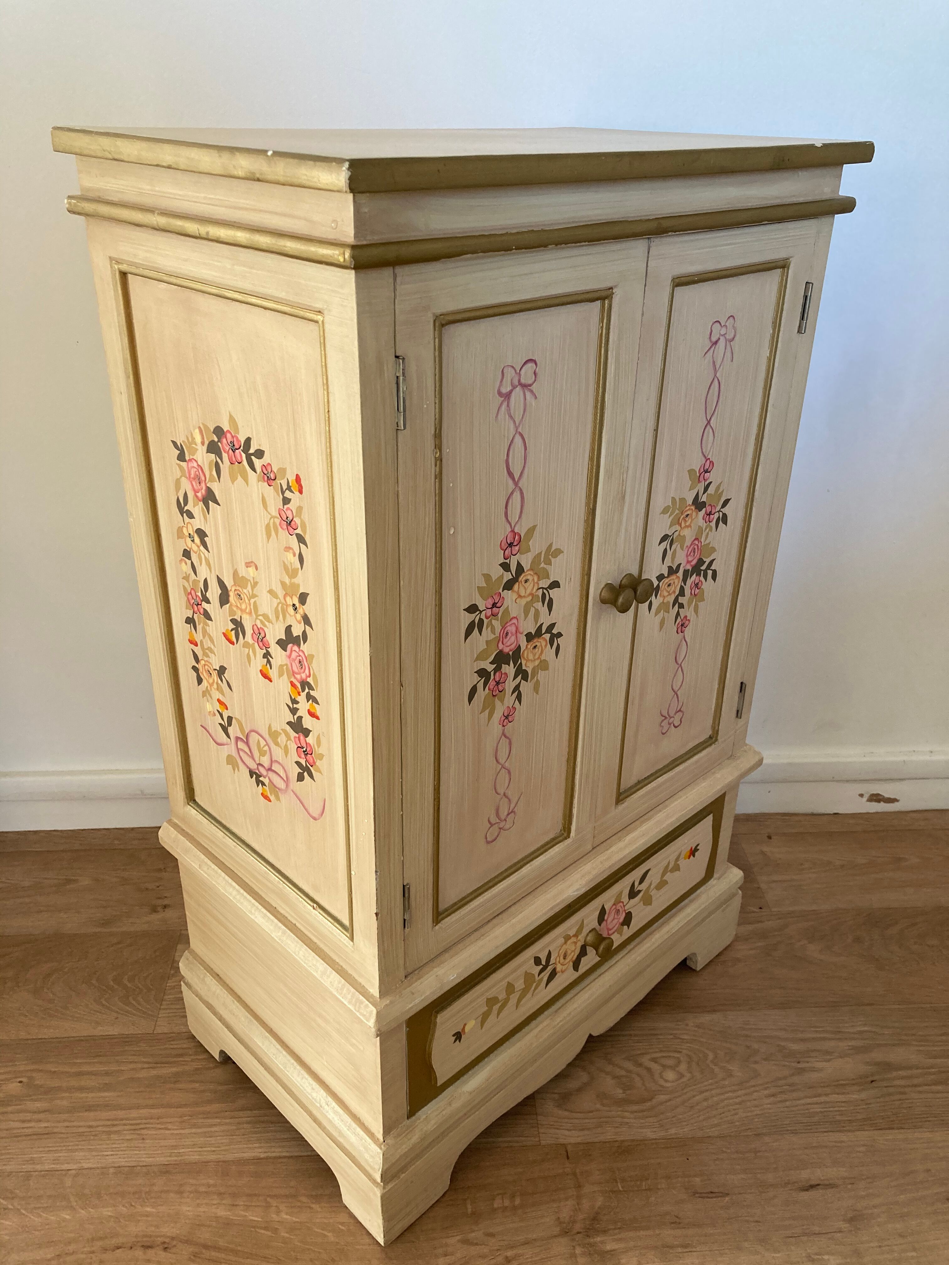 2-door flowered wooden cabinet