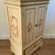 2-door flowered wooden cabinet