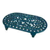 Dessous de plat ajouré en fonte bleu émaillé