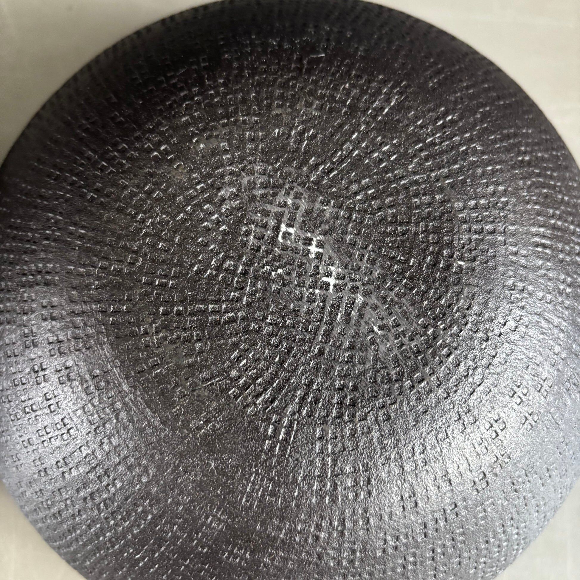 Pair of black lacquered metal catchall bowls