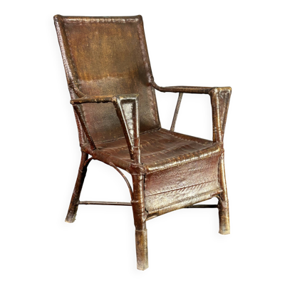 Fauteuil en rotin en faux cuir et toile cirée de style wabi-sabi, art déco colonial, années 1920.
