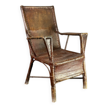 Fauteuil en rotin en faux cuir et toile cirée de style wabi-sabi, art déco colonial, années 1920.