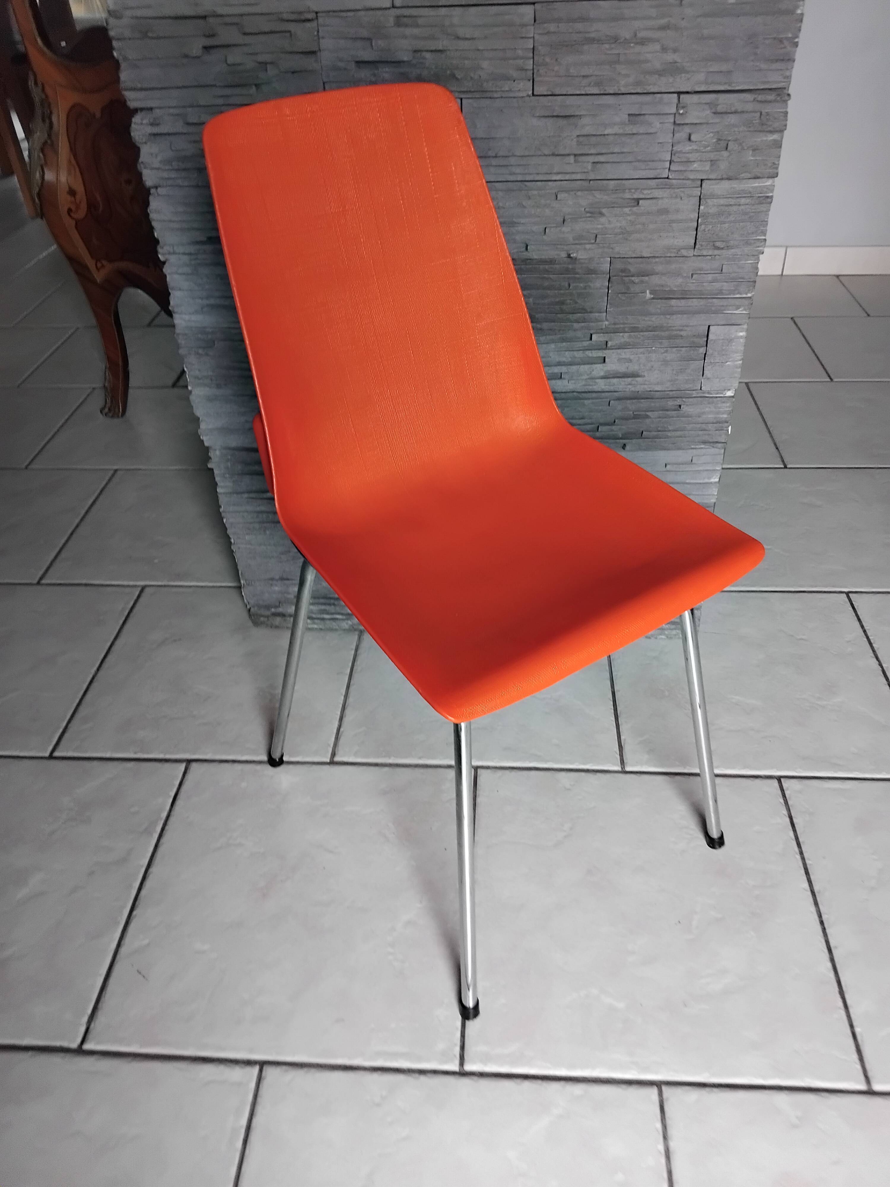 Chaise vintage grosfillex design rouge orangé