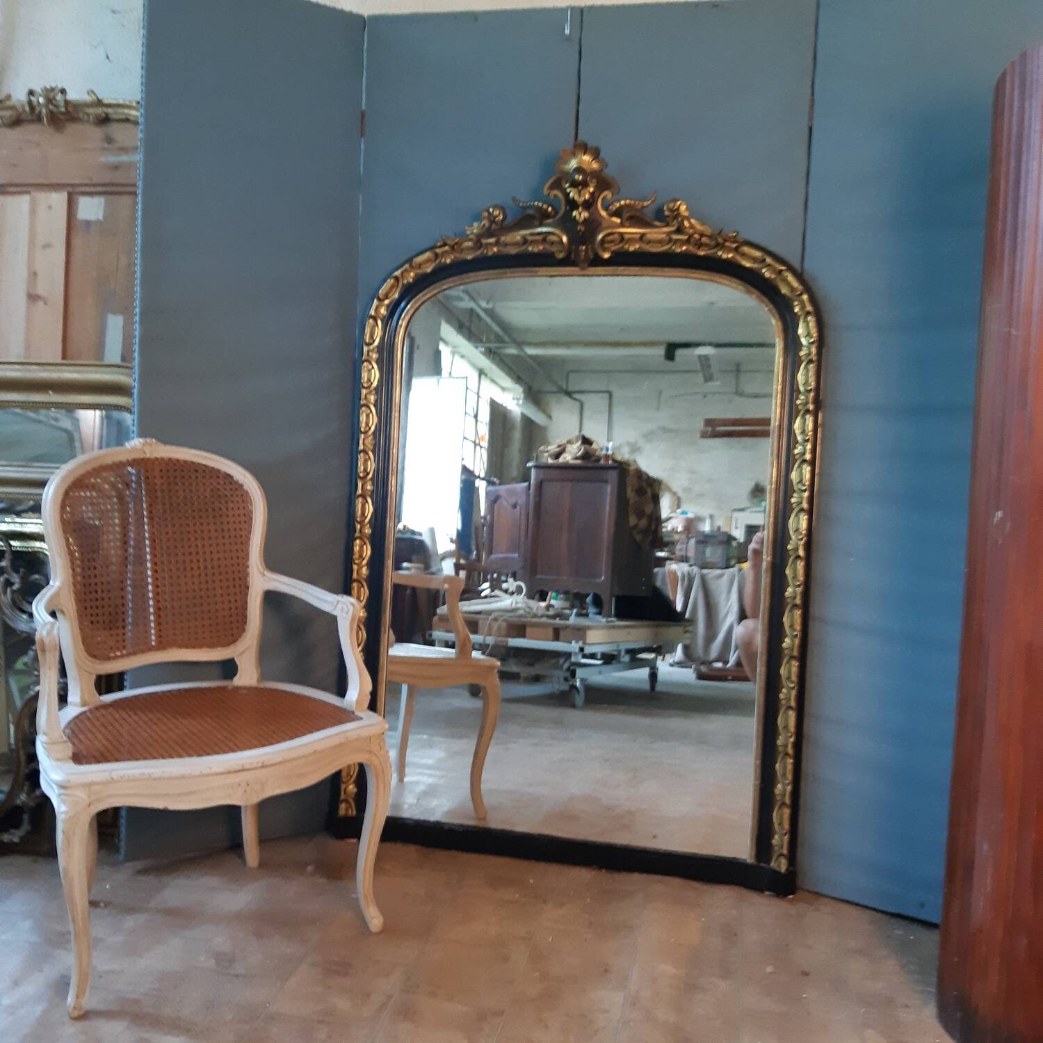Large black and gold Napoleon III mirror 148X98