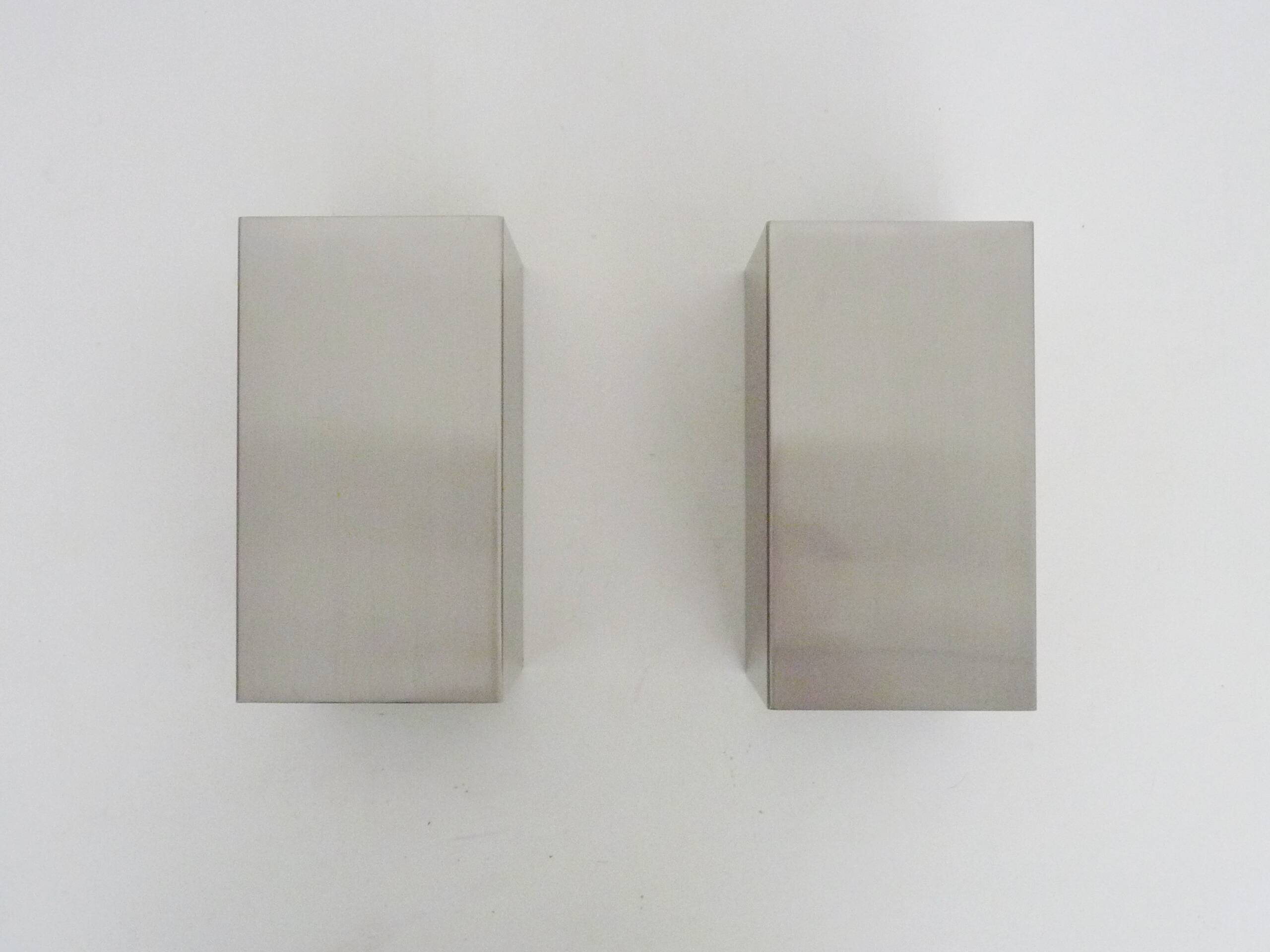Pair of vintage chrome wall lights in Massive stainless steel
