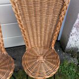 Pair of rattan foot black metal chairs