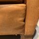 Brown leather armchair