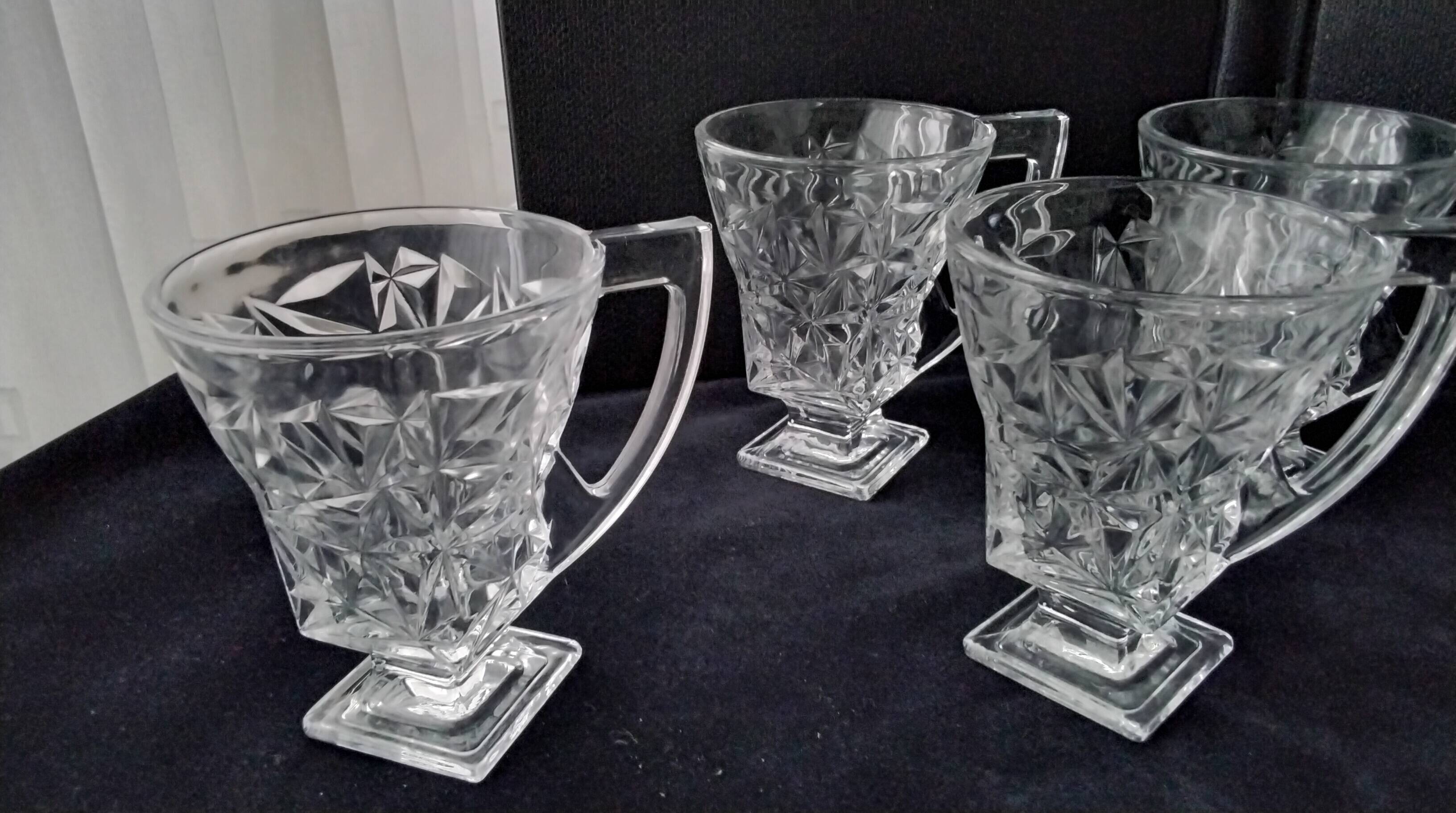 6 tea glasses with handles made of pressed moulded glass