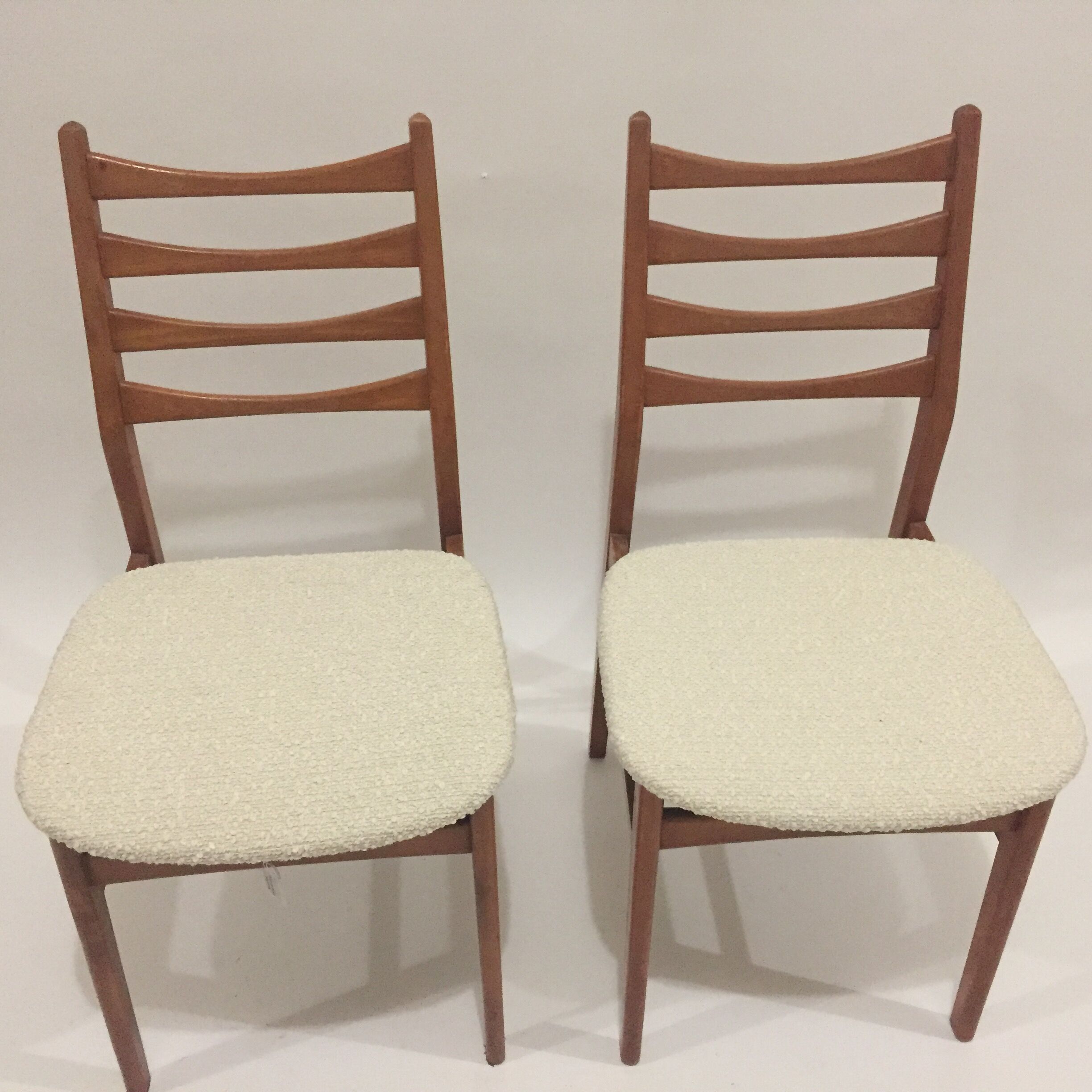 Pair of scandinavian chairs with loop fabric